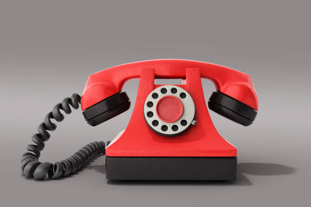 istock Hot line concept Red vintage telephone taking a call ideal for contact page 3d render on grey 994242908