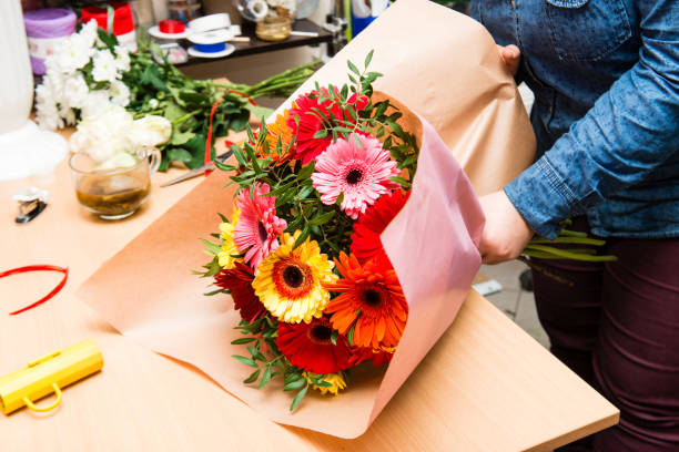 istock Woman working in flower shop 994251840