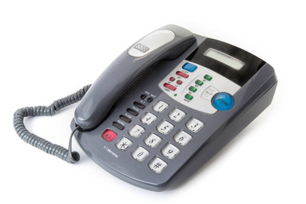 istock Office Desk Telephone with Coiled Phone Cord 994251992