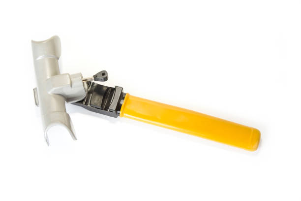istock Steering wheel lock for the car on the white 994252068