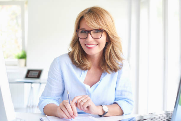istock Successful businesswoman working at modern office 994259190