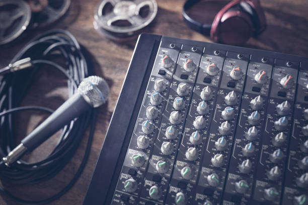istock Sound recording studio mixer desk with microphone 994259414