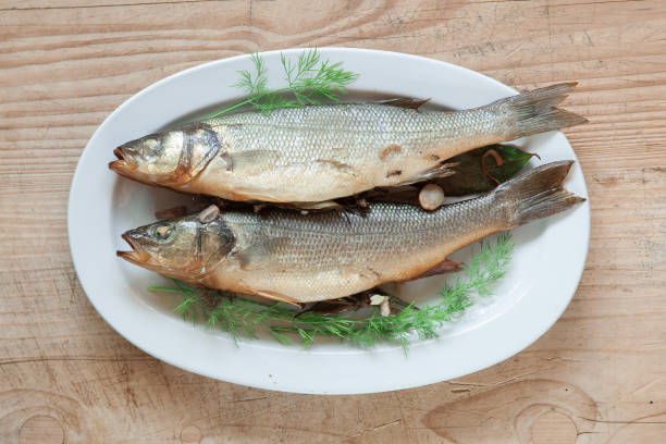 istock grilled sea bass, whole fish 994262904