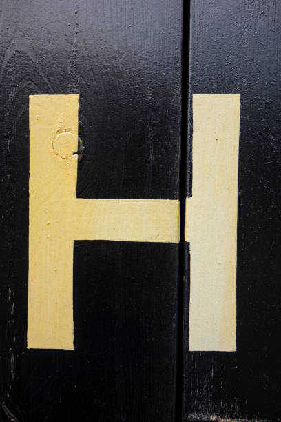 Written Wording in Distressed State Typography Found Letter H