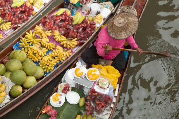 istock floating market sales woman 994266644