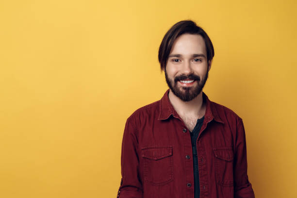 istock Portrait of Young Smiling Bearded Man 994266684