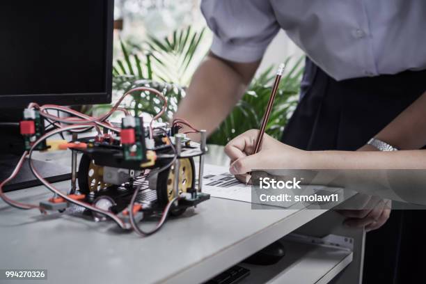 Student Learning Stem Education Robotics For Creating Project Based Studying For Innovation Robot Model New Study Generation For Diy Electronic Kit In Computer Teachnology Classroom Stock Photo - Download Image Now