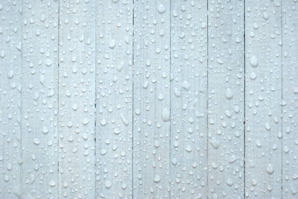 white wooden background with rain drops