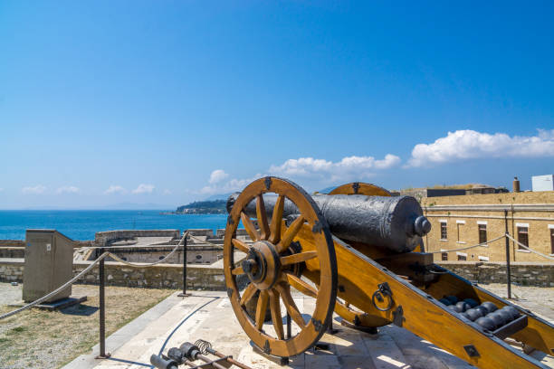 istock old cannon shooting to the water 994289332