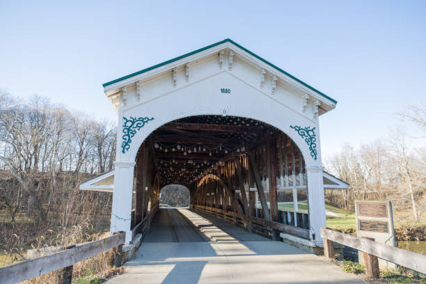 istock American Covered Wood Bridge on a Sunny Winter Day with Blue Sky 994294214