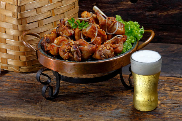 istock Brazilian style fried chicken with cold beer 994297670