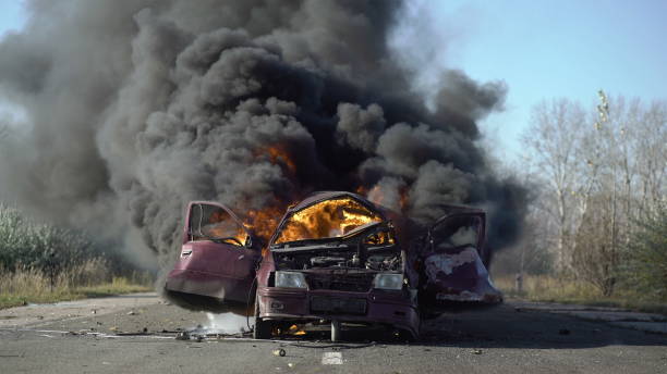 istock Car On Fire On The Road. Car Explosion. 994298678