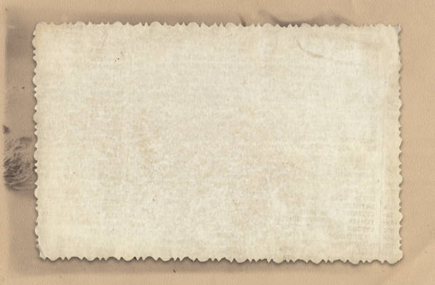 istock Vintage paper on retro photo texture background 994318630