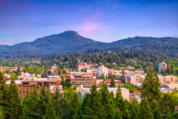 Eugene, Oregon, USA Skyline Eugene, Oregon, USA downtown cityscape at dusk. butte rocky outcrop photos stock pictures, royalty-free photos & images