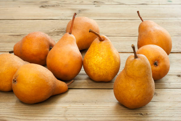 istock Pears on old weathered wooden table 994331686