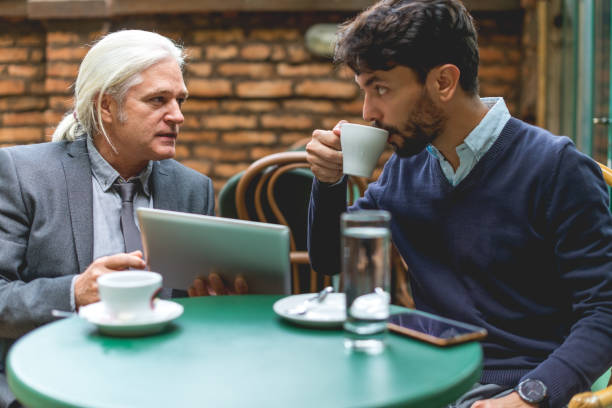 istock Two colleagues have a meeting in the cafe 994346150
