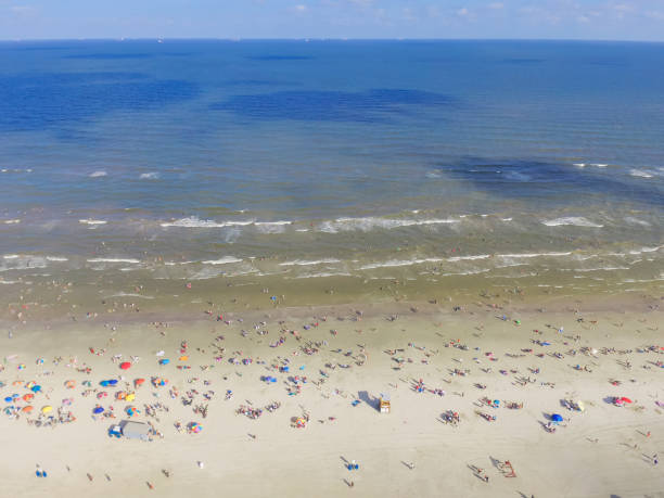 istock Bird eye view beach shoreline on sunny Teas summer day 994363388