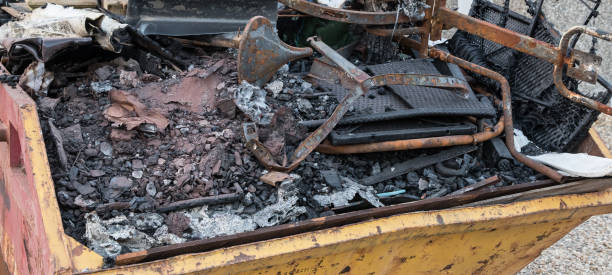 istock House contents damaged by fire dumped in a skip 994363438