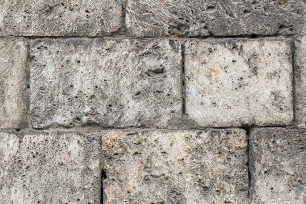 istock Background of dirty white block wall texture. 994367734