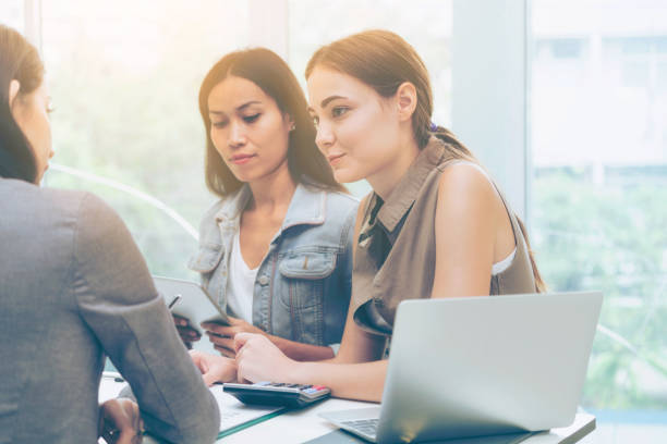 istock Multicultural businesswomen in group meeting. 994372140