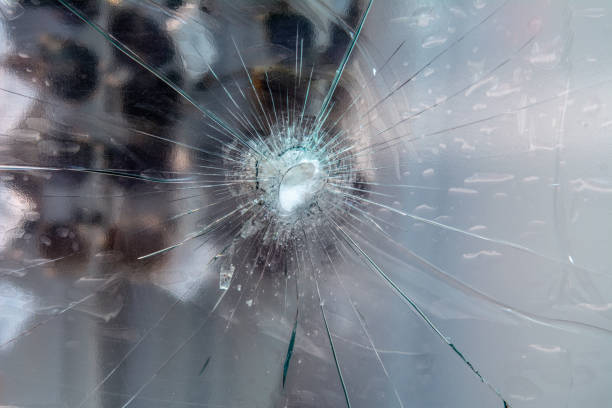 istock Close up cracked shop window 994374906