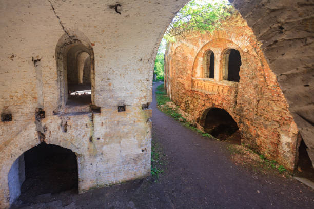 istock old ruined buildings with arches at sunny day 994390382