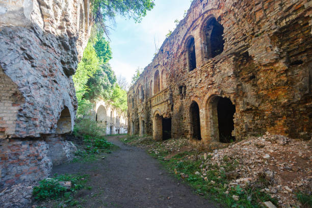 istock old ruined buildings with arches at sunny day 994390508