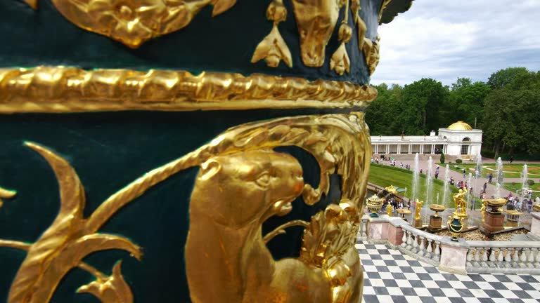 Tracking shot showing Grand Palace Cascade and Samson fountain in Peterhof, Saint Petersburg, Russia