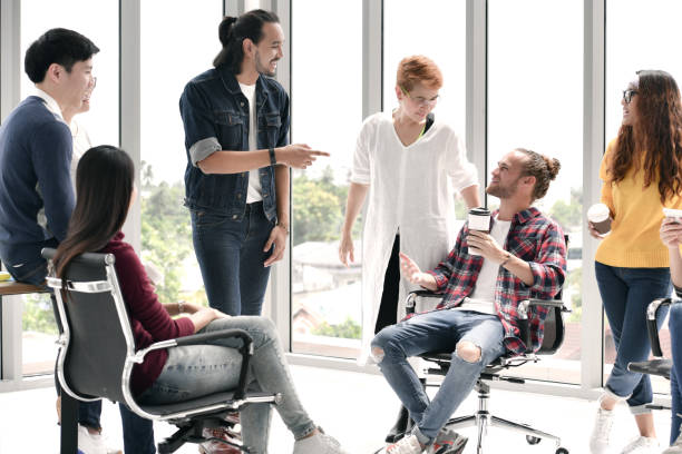 istock Group of businesspersons discussing work at the office 994418528