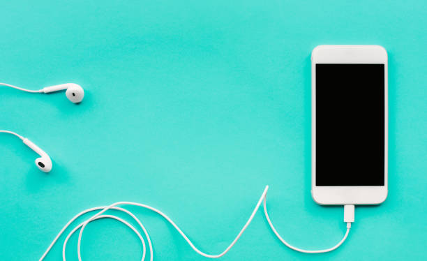 istock White smartphone,mobile on blue color background. communication and technology concept 994418856