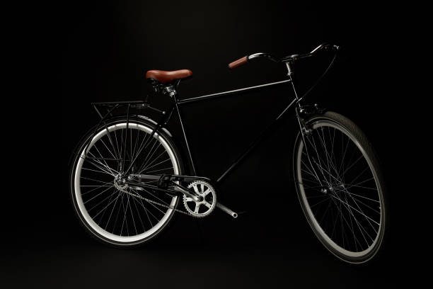 istock side view of comfortable vintage bicycle isolated on black 994421638