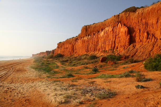 istock Sandy red cliffs in praia da Falesia 994421770