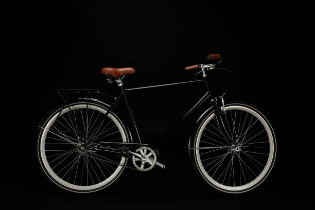 istock side view of classic vintage bicycle isolated on black 994421950