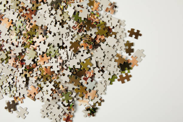 istock top view of jigsaw puzzle pieces with copy space on grey 994421994