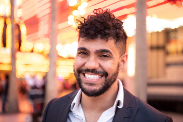istock Portrait of man with beard smiling at camera 994425020