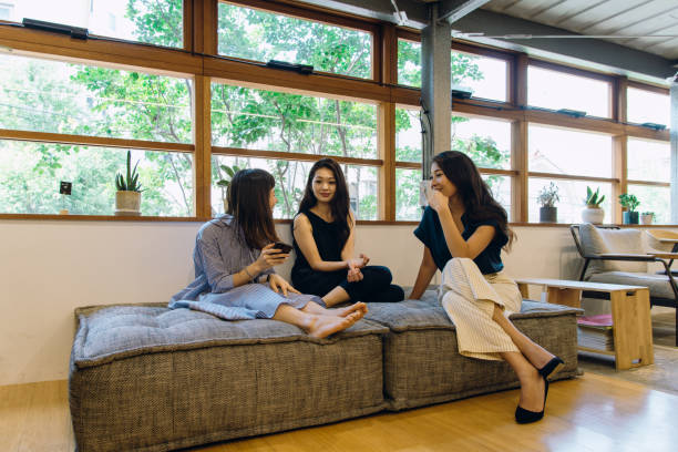 istock Young women discussing at the cafe. 994432220