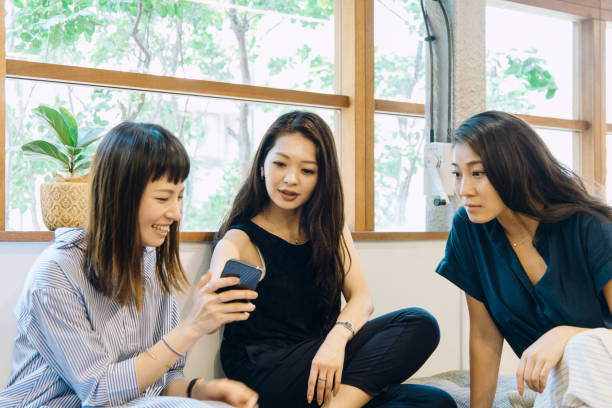 istock Young women discussing at the cafe. 994432366