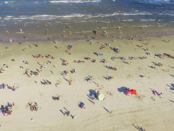 istock Bird eye view beach shoreline on sunny Teas summer day 994440168