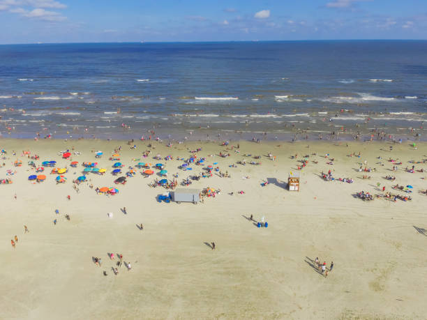 istock Bird eye view beach shoreline on sunny Teas summer day 994440244