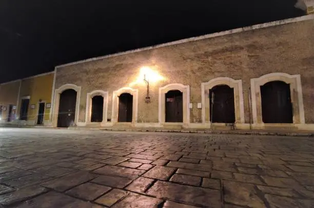 The city of Izamal has beautiful lighting, giving the buildings just enough lighting to keep it very nostalgic, while reflecting on the streets of stones.