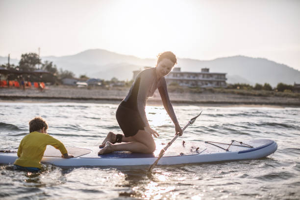 istock Surfing Lessons for my little one 994464996