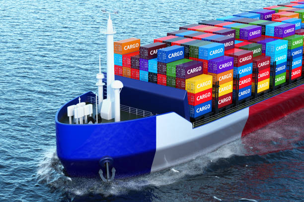 istock French freighter ship with cargo containers sailing in ocean, 3D rendering 994470752