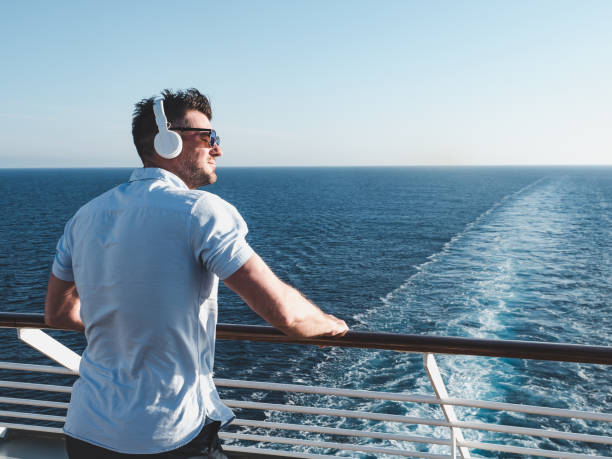 Man on the deck of a cruise ship