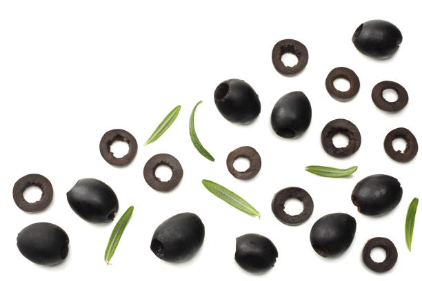 istock Marinated slices black olives isolated on white background. top view 994475530