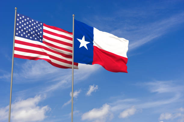 istock USA and Texas flags over blue sky background. 3D illustration 994476486