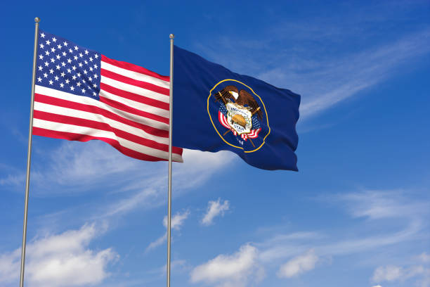 istock USA and Utah flags over blue sky background. 3D illustration 994476504