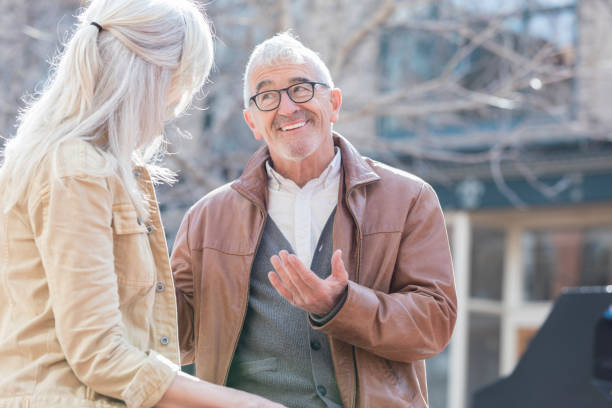 istock Senior man gestures while talking with wife 994478560
