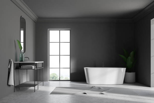 istock Gray loft bathroom interior, sink and tub 994482484