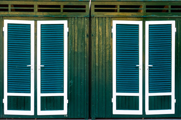 istock green cabins changing rooms beach background texture 994485110