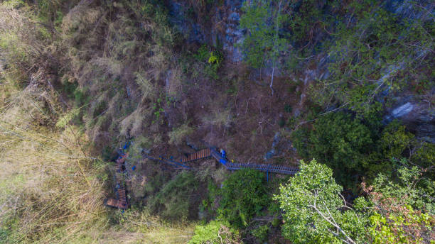istock stairway to hill top new bridge beside the cliff. 994495854